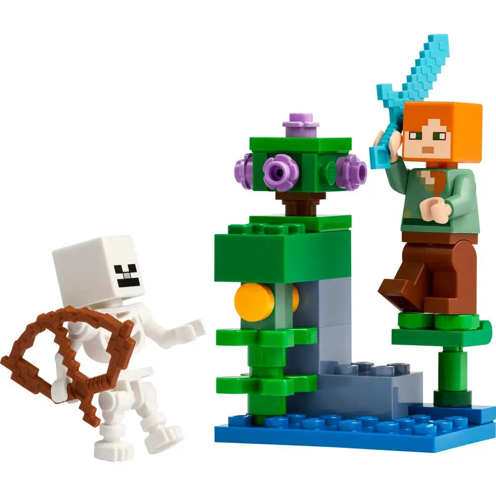 LEGO Minecraft The Lush Cave Fight set 30705 includes a small brick-built scene with green and purple vegetation, Alex mini-figure with a sword, and a skeleton with a bow in a dynamic battle pose.