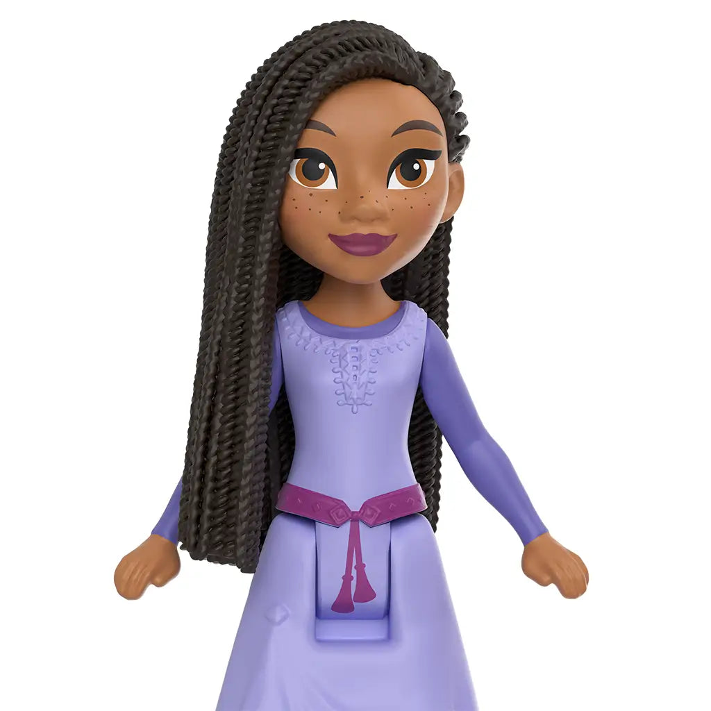 Disney Wish Asha doll features a long purple dress with pink belt, sculpted braids, and expressive painted face, designed for imaginative play with storytelling adventures.