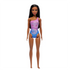 Barbie doll standing upright with long dark hair and a vibrant purple-to-blue ombre one-shoulder swimsuit, detailed with white hibiscus flowers and wavy designs.