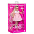 Barbie Deluxe Style fashion doll in pastel pink Barbiecore dress, displayed in pink packaging with accessories including purse, shoes, and jewelry.