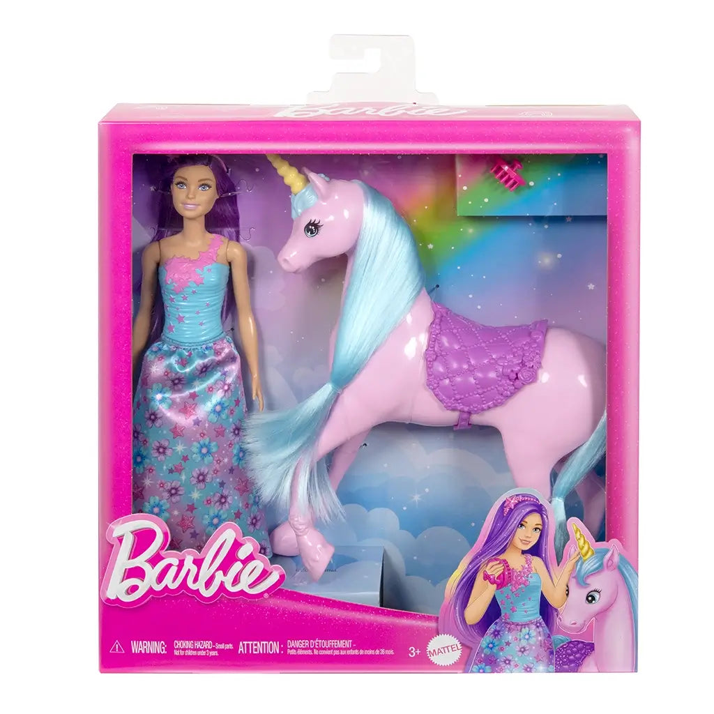 Mattel Barbie doll and pink unicorn playset in retail packaging, showing the purple-haired Barbie with floral dress and her pastel unicorn with yellow horn and blue mane.