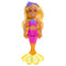 Full view of Barbie Mermaid Chelsea doll standing upright with long blonde hair, pink and purple mermaid top, orange scales, and translucent yellow tail fin.