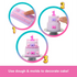 Barbie Party Unboxed playset feature shows using included dough and molds to decorate a tiered birthday cake with pink bows, stars, and a large number one candle topper.
