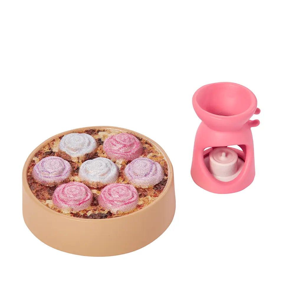 Barbie Self-Care Spa Day doll with blonde hair in lemon-print robe, pink sandals, blue mask, spa bath set, puppy, duck, bath bombs, and aromatherapy pieces.