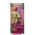 Barbie Self-Care Spa Day doll set in packaging, featuring blonde Barbie in a lemon-print robe with pink headband, spa accessories, and brown puppy figure included.