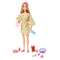 Full Barbie Self-Care Spa Day doll holding a spa mask, wearing a lemon-print robe and pink sandals, posed with included puppy, spa bath, and accessories.