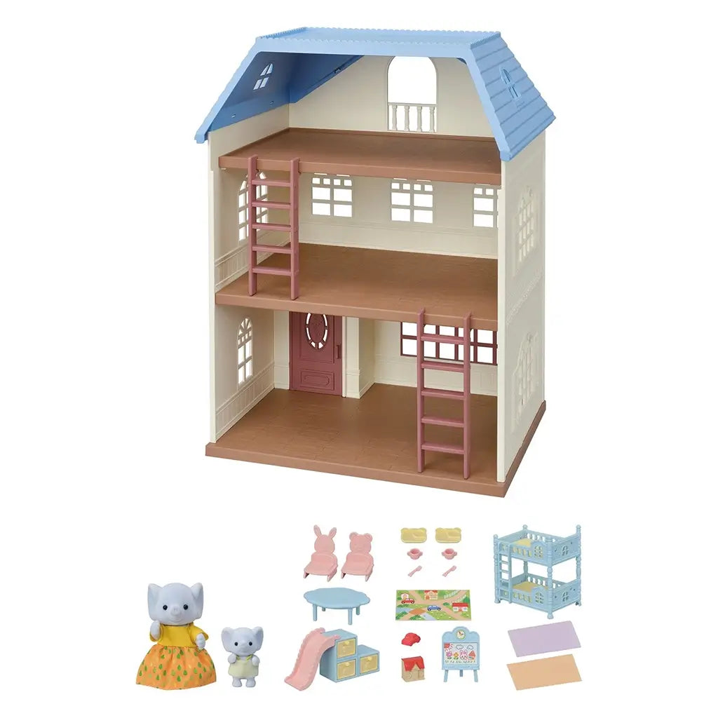 Calico Critters Sky Blue Terrace playset includes cream three-story house with blue roof, ladders, accessories, and two critter figurines alongside pastel furniture and toys.