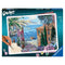 Ravensburger CreArt paint by numbers kit box featuring a Mediterranean landscape design with terracotta villas, blue sea, flowering plants, and a hand holding a brush painting details.
