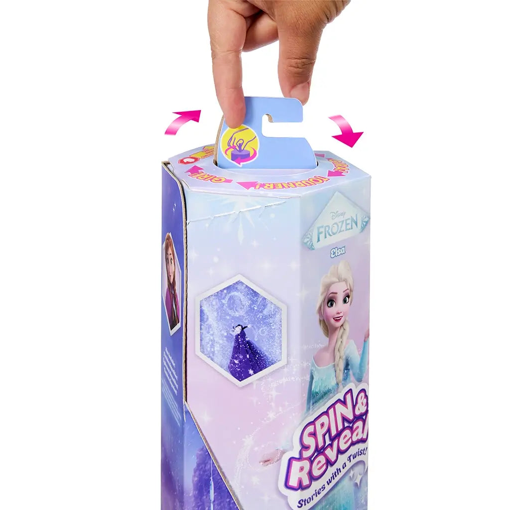 Disney Frozen Spin & Reveal Elsa doll packaging in pastel purple and blue with rotating reveal feature, showing Elsa artwork and snowflake accents for interactive unboxing play.