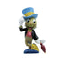 Front view of Jiminy Cricket figure wearing blue hat, black jacket, and red vest, holding umbrella with a smile; Disney Showcase 85th anniversary Pinocchio collectible.
