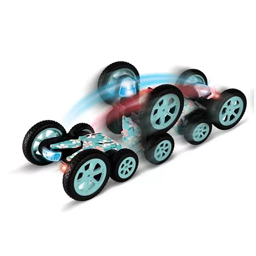 Genesis Floral LED Stunt Racer in motion, showing teal wheels and glowing lights as the vehicle performs a high-speed flip, leaving a colorful blur effect that highlights its acrobatic movement.