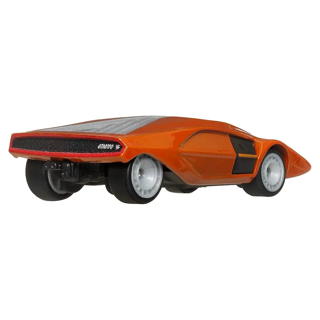 Rear angle view of Hot Wheels Premium Lancia Stratos Zero toy car with orange body, black rear detail, and wide wheels, modeled after the concept car.