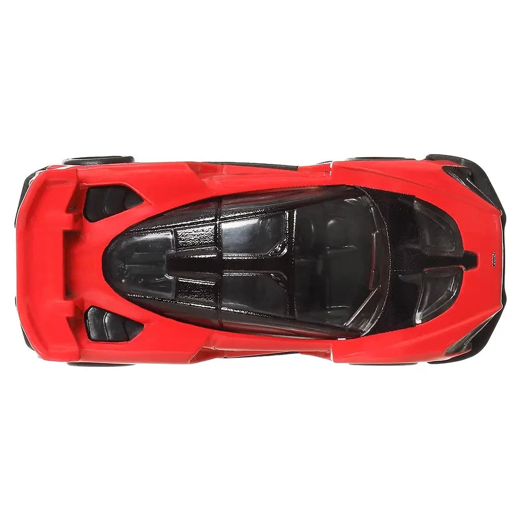 Top view of Hot Wheels McLaren Senna die-cast car in red with black roof, aerodynamic design, and detailed body lines.