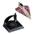 Hot Wheels Obi-Wan Kenobi’s Delta-7 Jedi Starfighter toy ship displayed next to its detachable black stand with silver Galactic Republic emblem, highlighting its removable display feature and compact scale.