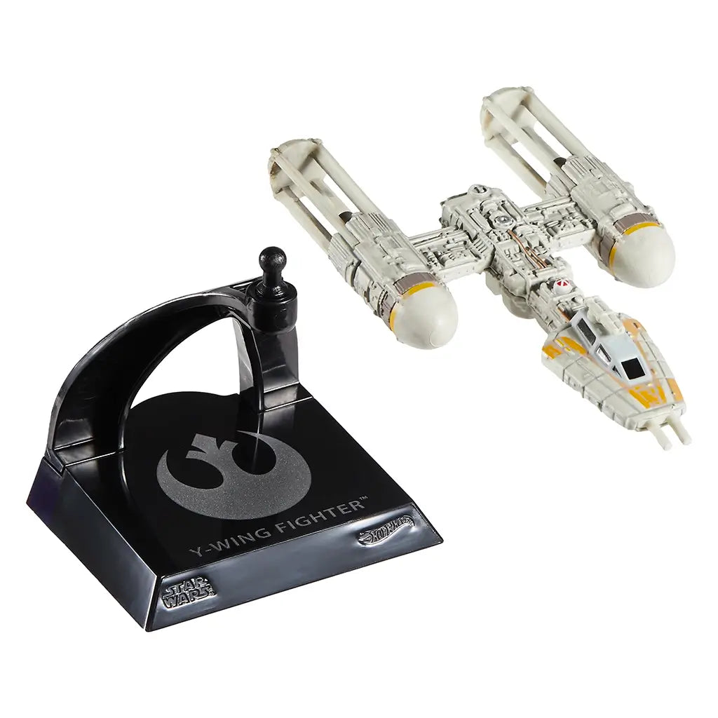 Hot Wheels Y-Wing Fighter die-cast ship shown disassembled from its black display stand featuring the Rebel symbol and “Y-Wing Fighter” label, emphasizing the collectible’s removable and poseable feature.