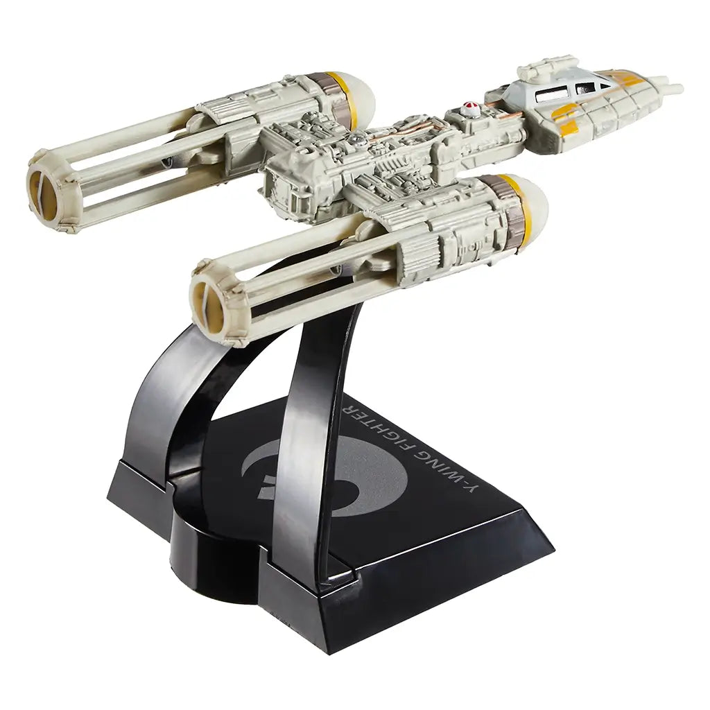Rear-angled view of the Hot Wheels Star Wars Y-Wing Fighter toy ship with long twin engines, weathered white finish, and intricate mechanical textures on a display stand marked with the Rebel Alliance logo.