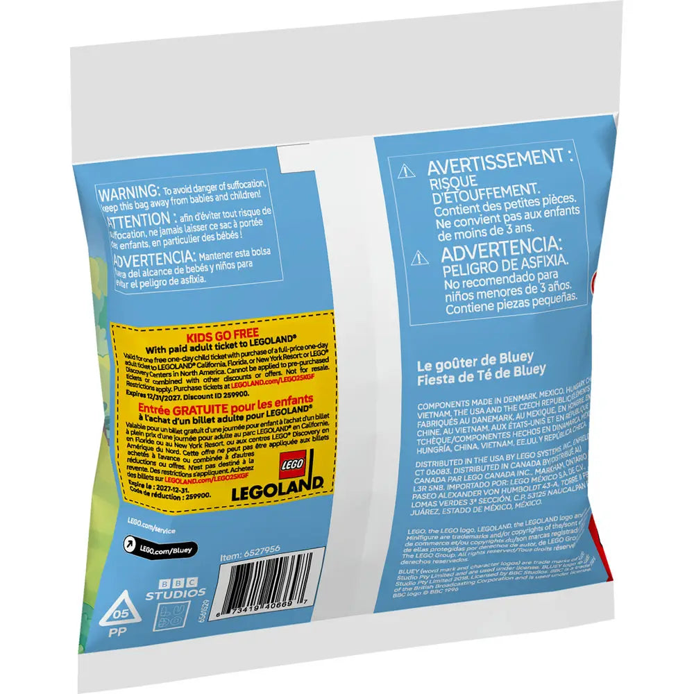 Back of LEGO Bluey 30687 “Bluey Tea Party” polybag showing safety warnings in multiple languages, LEGOLAND “Kids Go Free” offer, and manufacturing details on a blue and white background.