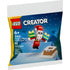 LEGO Creator 30692 “Christmas Chimney Fun with Santa” package showing Santa jumping with two presents above a snowy rooftop, with LEGO branding and product details for ages 6 and up.