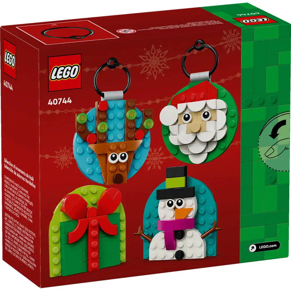 Back of LEGO 40744 Christmas Ornament Selection box featuring all four festive ornaments with a snowy background.