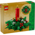 Back of LEGO 40743 Christmas Table Decoration box displaying the completed build with red candle and pine foliage, plus inset image highlighting an alternate wreath-style view.
