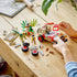 The LEGO® Jurassic World Dilophosaurus Ambush 211 Piece Building Set in mid build.
