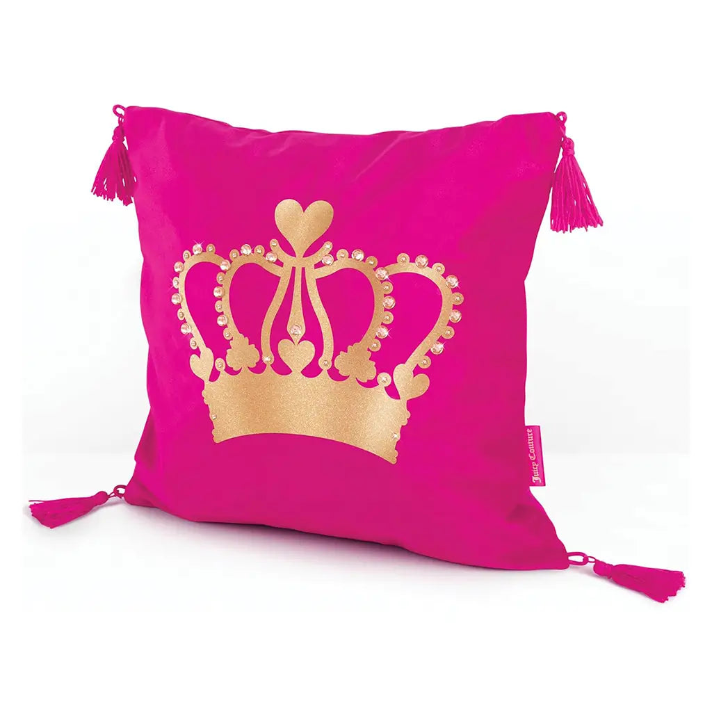 Pink Juicy Couture pillow with a gold glitter crown design and pink tassels on each corner, showcasing a trendy DIY home decor accessory for tweens.