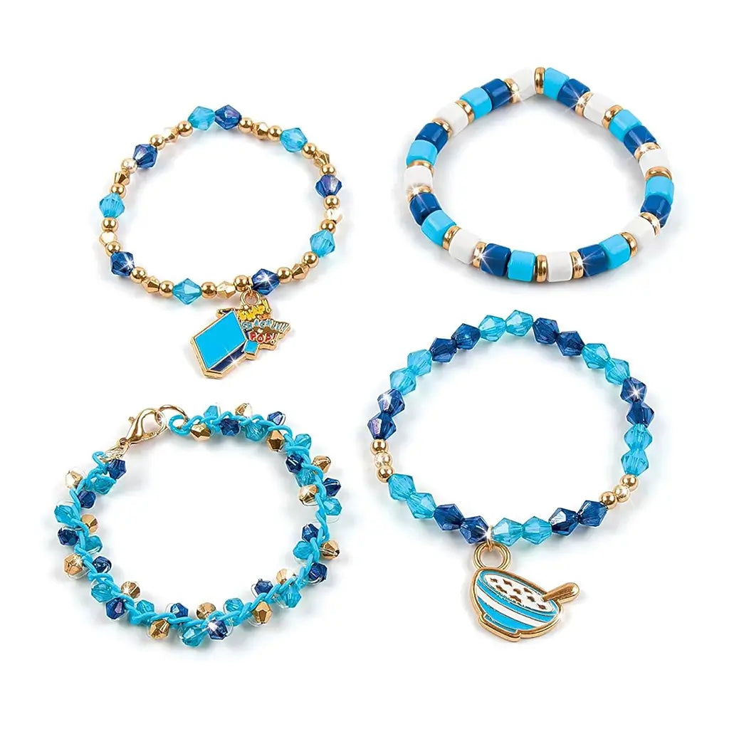 Set of four Kellogg’s Rice Krispies-inspired bracelets made with blue, gold, and white beads and enamel charms depicting a cereal bowl and milk carton, displayed on white background.