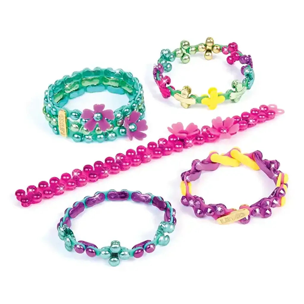 Vibrant Linxo celebration-style bracelet collection in metallic pink, teal, and gold tones with flower motifs, arranged neatly on a white background, showcasing colorful DIY jewelry options.
