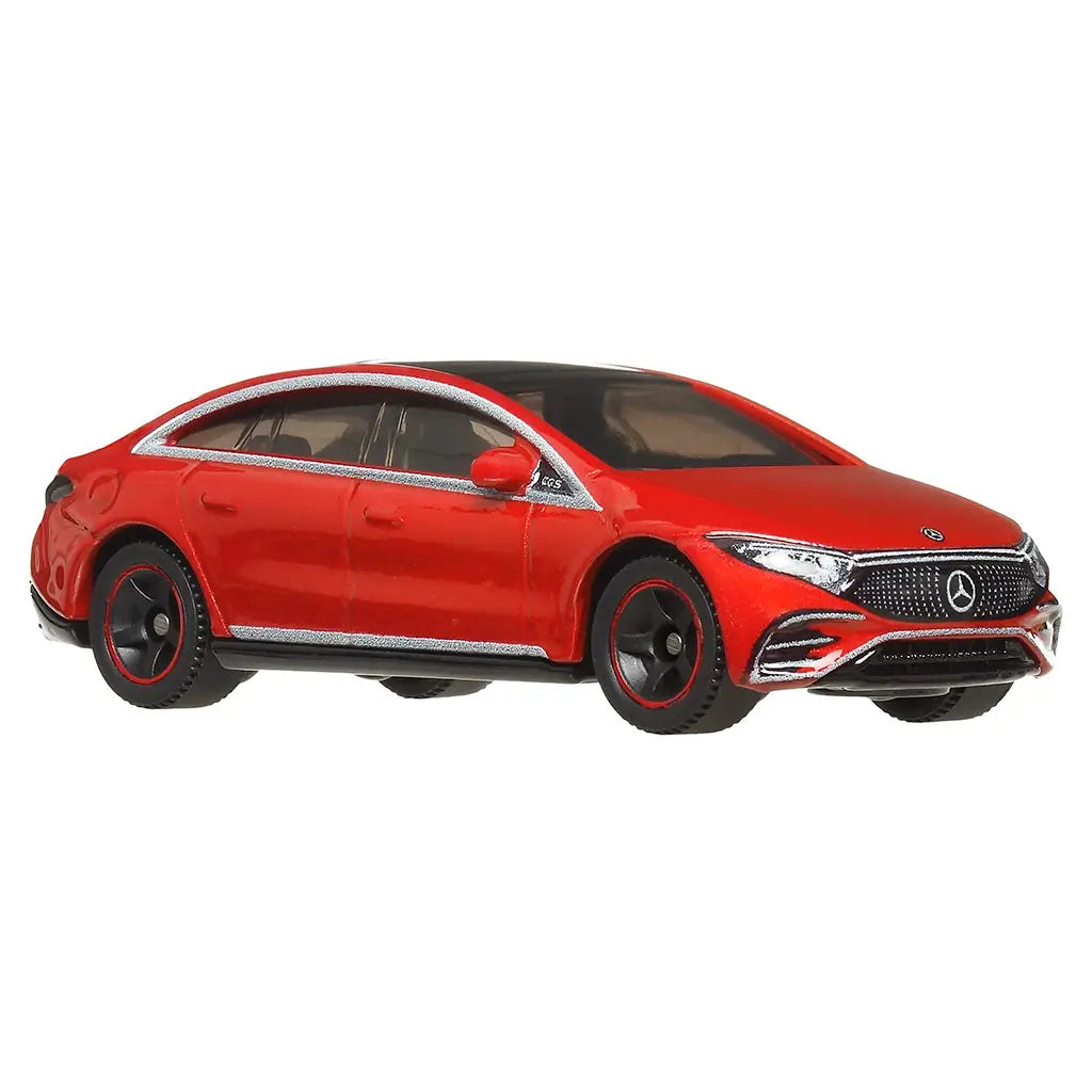 Matchbox 2022 Mercedes-Benz EQS die-cast collectible in red with chrome accents and black wheels, displayed from a front angled view highlighting grille details.