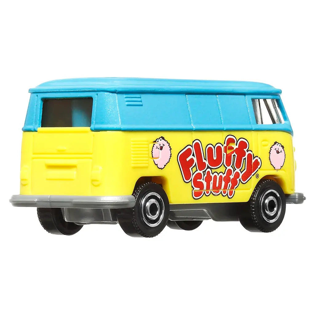 Diecast Matchbox Volkswagen delivery van toy in blue and yellow with “Fluffy Stuff” cotton candy logo and cartoon puffs, shown from rear angled side on white background.