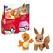 Retail package of Mega Pokémon Charmander and Eevee building set, showing boxed figures, two Poké Ball cases, branding logos, bilingual warning labels, and assembled toy figures in front.