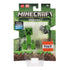Minecraft Creeper action figure in retail packaging, featuring TNT block and flint & steel accessories, designed with pixelated game-inspired details.