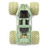 Top view of Monster Jam Soldier Fortune diecast truck shows desert camouflage pattern, tinted cab windows, and oversized beige wheels arranged in wide stance around rugged frame.