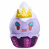 Studio shot of Disney Munchlings Ursula plush toy designed like a purple cupcake with white whipped topping and gold crown, featuring embroidered eyes, red lips, and soft fabric texture for display or cuddles.