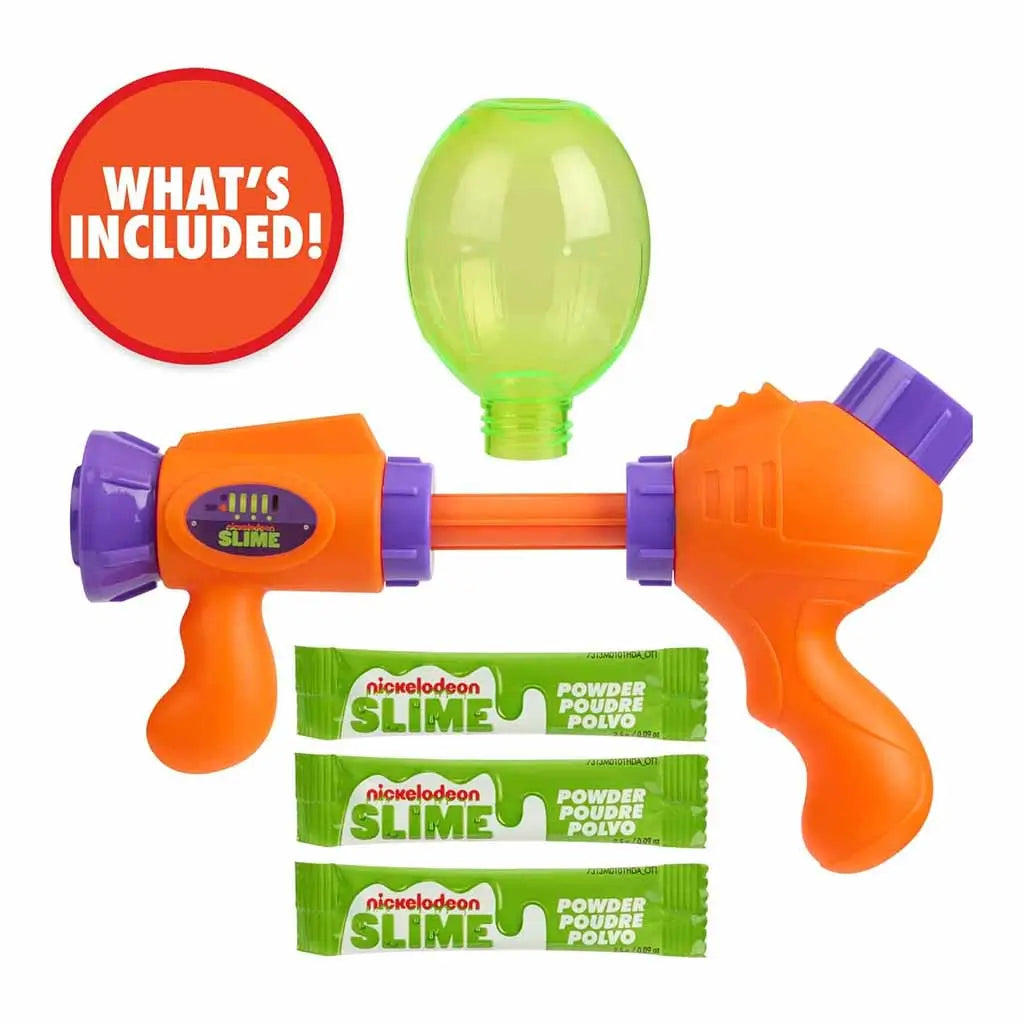 Contents of Nickelodeon Slime Splat Splasher set displayed on white background, including orange and purple blaster, green tank, and three Nickelodeon Slime powder packets.