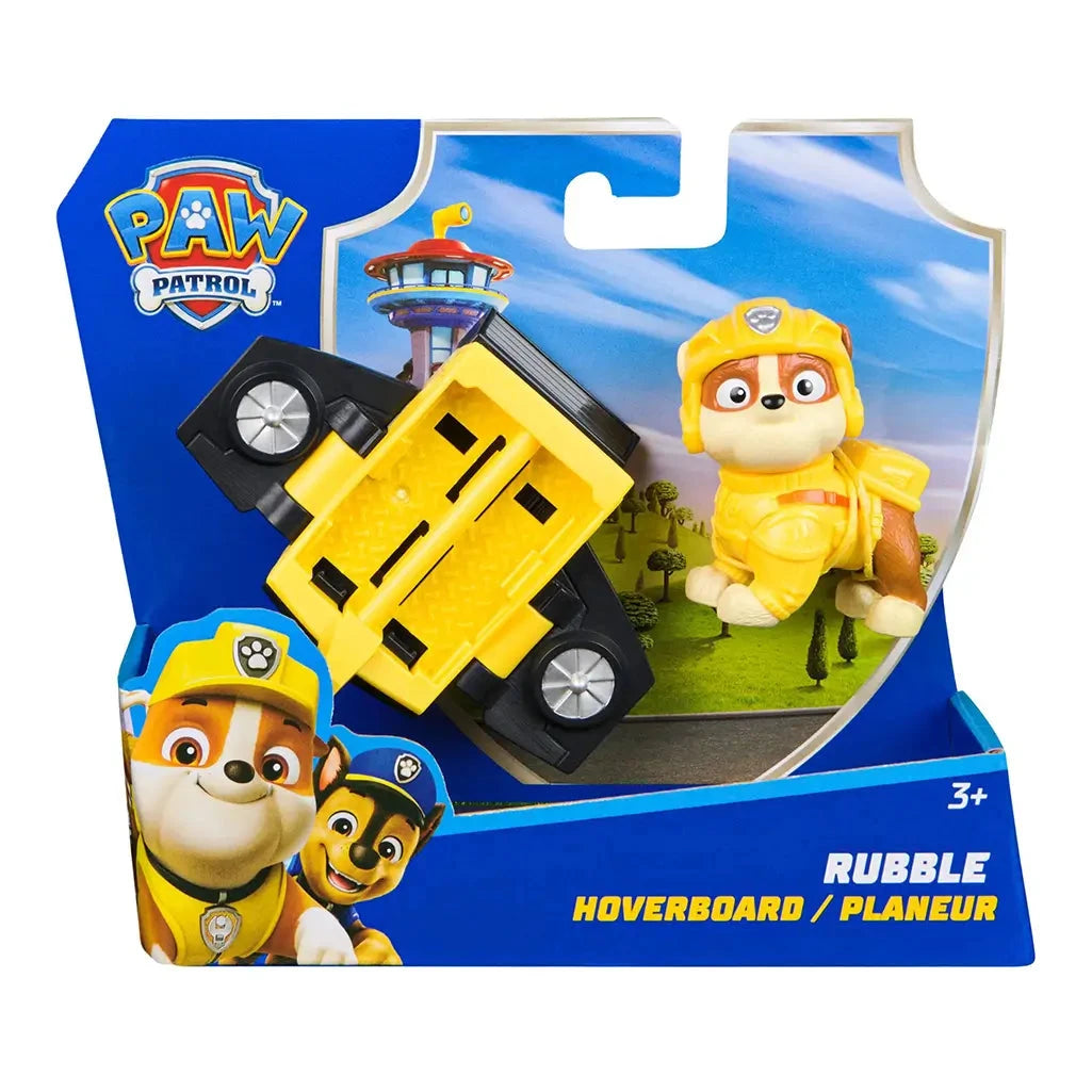 PAW Patrol Rubble hoverboard toy set in retail packaging, includes exclusive Rubble figure in yellow gear and yellow-black hoverboard for kids aged 3 and up.