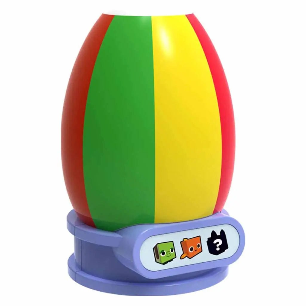 Colorful Pet Simulator Series 1 mystery egg from PhatMojo with vertical red, yellow, and green stripes on smooth surface, displayed on light blue stand with pet icons.