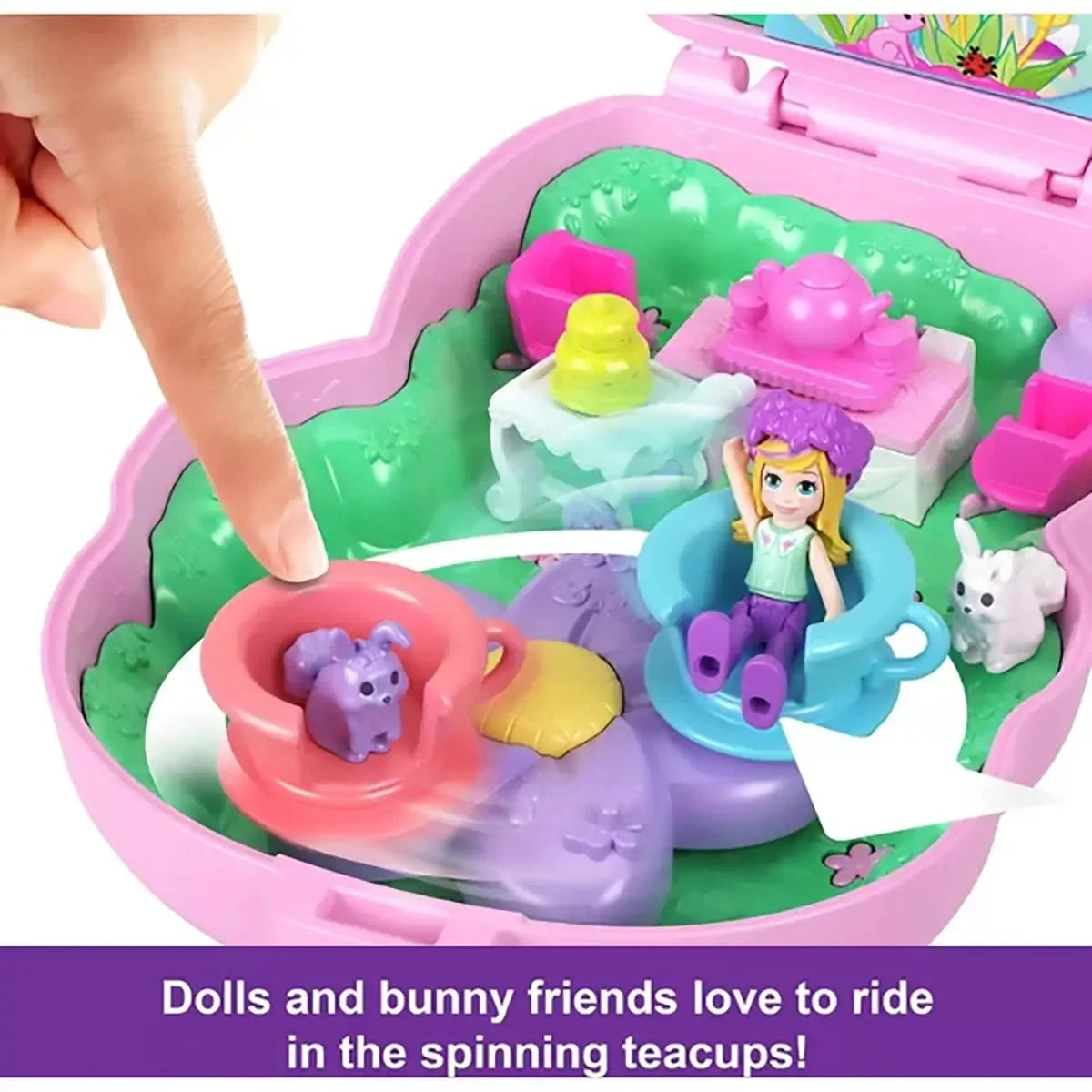 Polly Pocket Tea Party Bunny Compact Playset doll and bunny friends ride the teacups