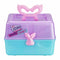 Close-up of Real Littles Micro Craft purple and teal storage box with pink mermaid tail handle and brand logo, emphasizing DIY craft toy packaging for fizz bomb creation.