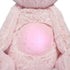 Plush unicorn cat toy’s glowing pink belly with faint star patterns on its soft fur, designed to light up gently for nighttime comfort.