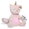 Musical unicorn cat plush toy in light pink fabric with gold horn, glowing pink belly, and embroidered face, shown emitting music notes.