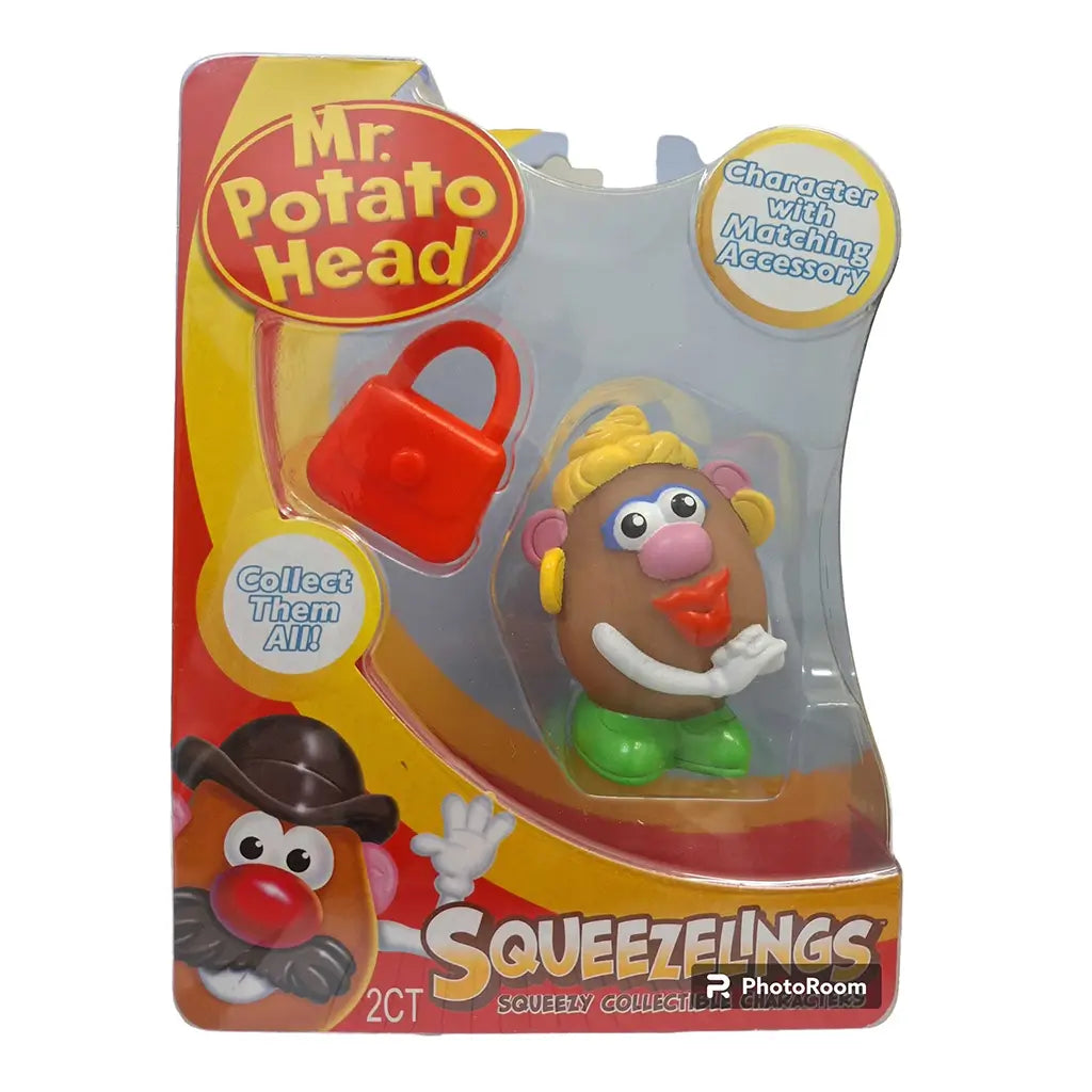 Mr. Potato Head Squeezelings toy package front featuring Mrs. Potato Head figure with blonde hair, green shoes, and red purse accessory in clear plastic packaging with yellow and red graphics.