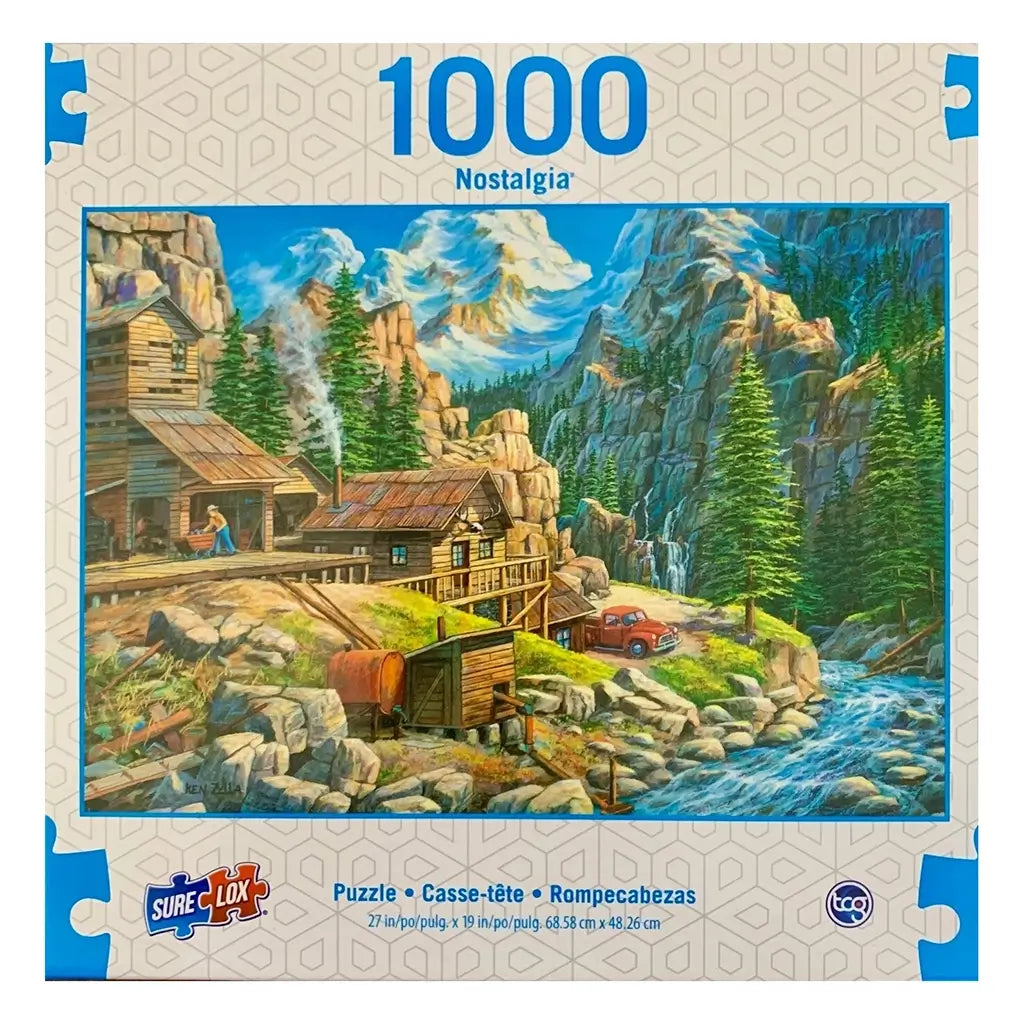 Front of Sure-Lox 1000-piece puzzle box titled 'Nostalgia: Prospecting Old Digs,' displaying a detailed mountain cabin scene with river, rocks, red pickup truck, and forest landscape.