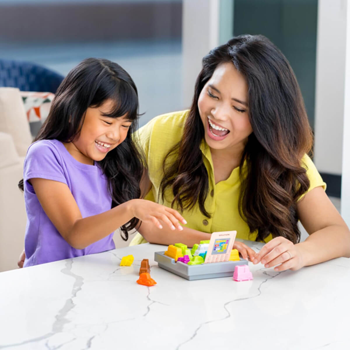 ThinkFun Rush Hour Game adult and child playing