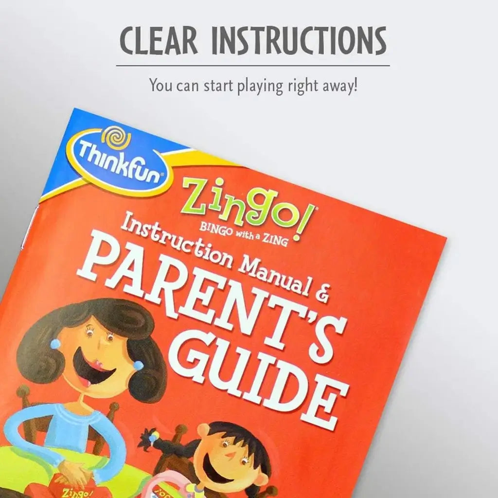 Close-up of ThinkFun Zingo Parent’s Guide with red cover and cheerful illustrations, showing clear instructions that help families quickly learn setup and rules for educational play.