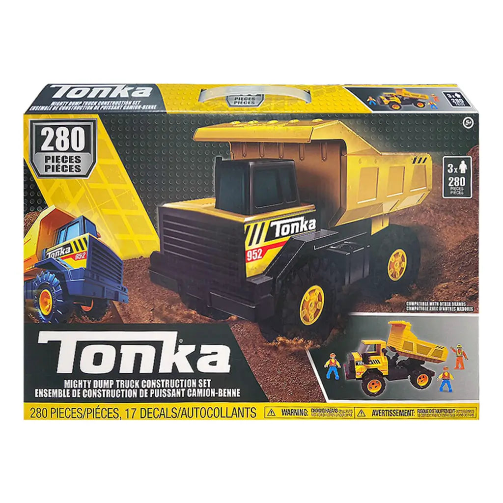 Tonka Mighty Dump Truck Construction Set box showing a large yellow dump truck with bold Tonka branding, 280 pieces, decals, and illustrated construction workers on a rugged dirt background.