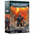Warhammer 40,000 Iron Hands Caanok Var miniature box, featuring a heavily armored Techmarine-style warrior with bionic limbs and mechanical weapons standing amid ruins and blazing orange skies.