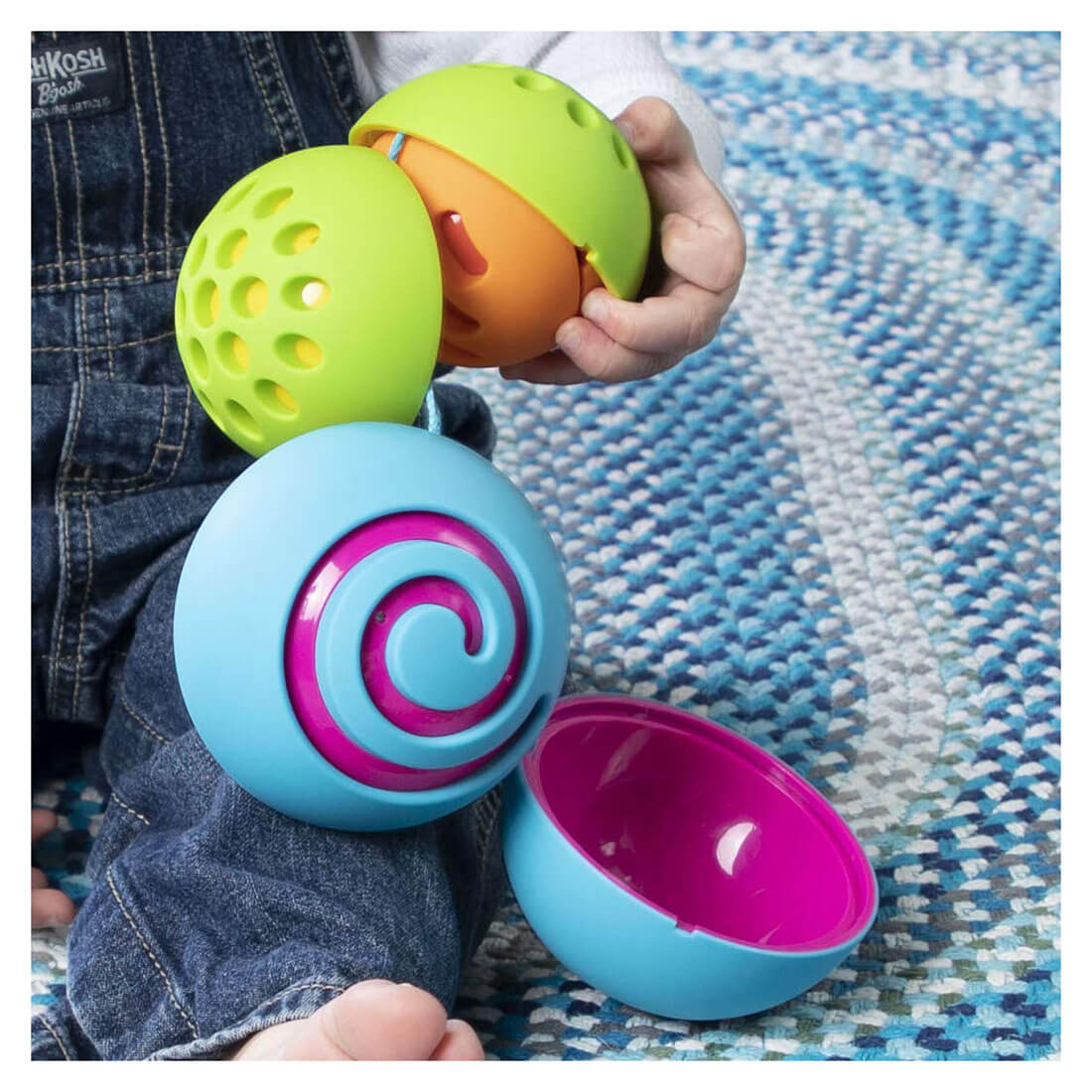 Baby playing with the toy.