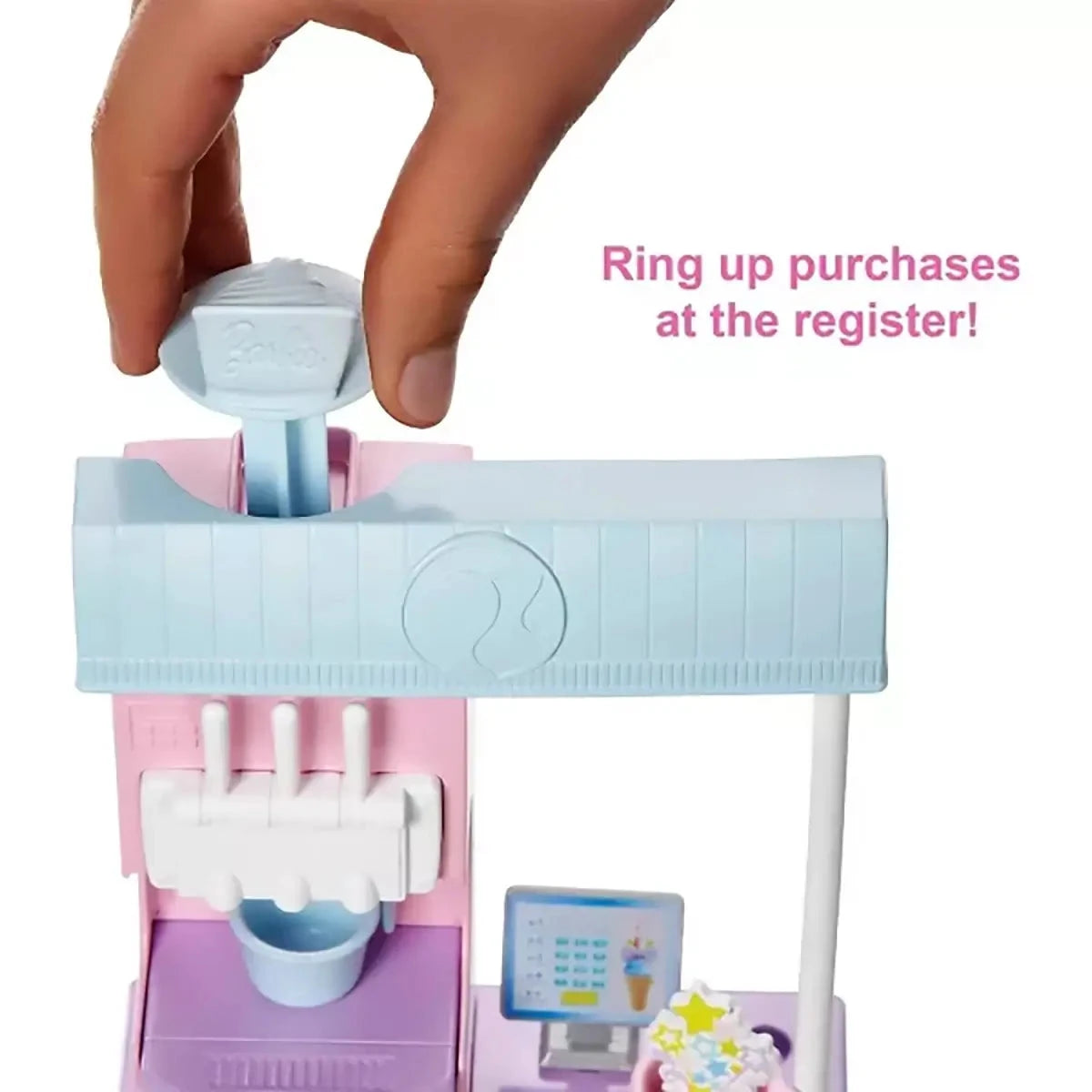 Barbie Ice Cream Shop Playset ring up purchases at the register